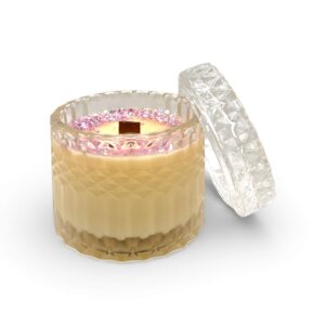 Elegant Baccarat Rouge scented soy candle in a decorative glass jar.