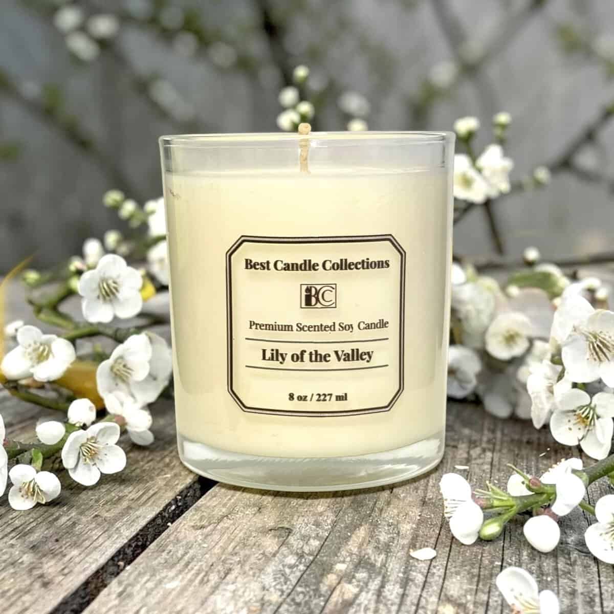 Fresh Lemon Handmade Soy Candle in a glass jar with floral background.