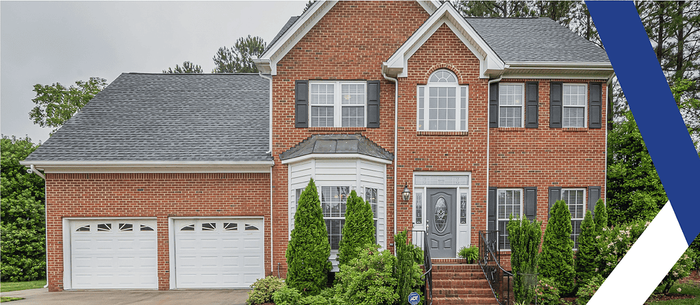 An image of the exterior of a brick home. Title Insurance Explained for First-Time Homebuyers