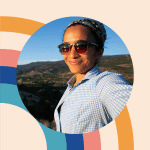 Woman enjoying a peaceful retreat with scenic mountain views in the background.