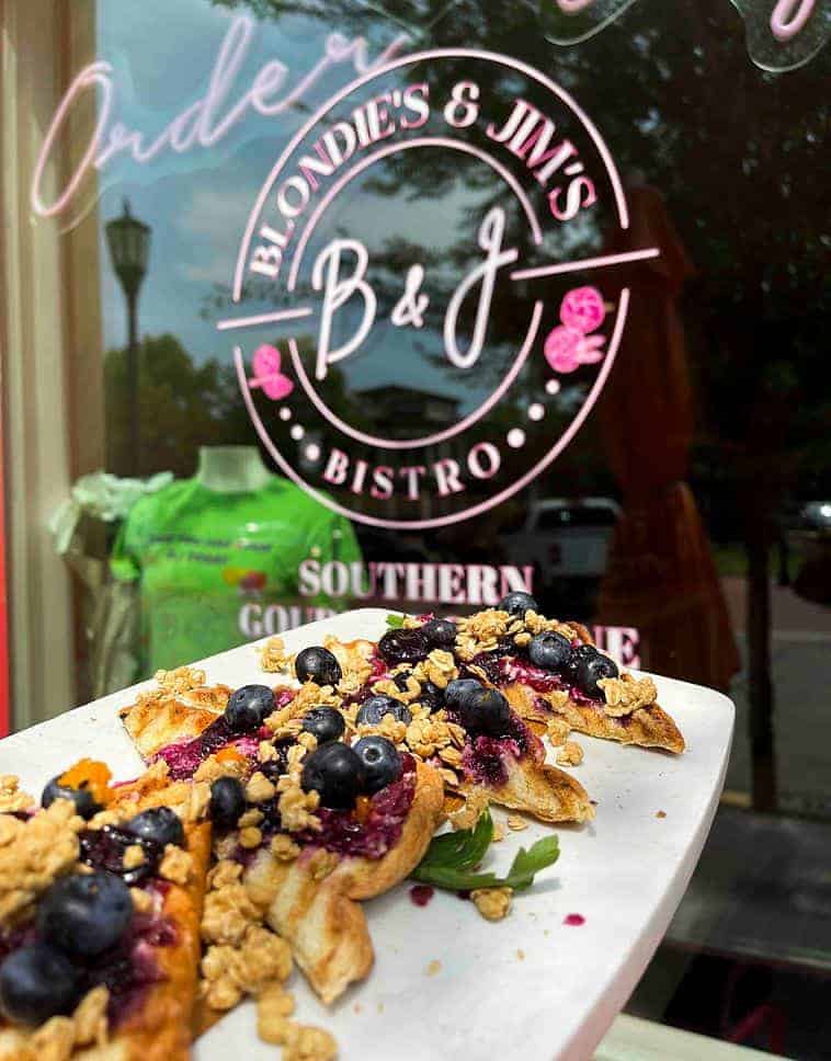 Black owned bakery offering gourmet desserts in a vibrant downtown setting.