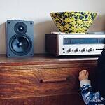 child listening to the radio