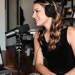 woman recording a radio jingle