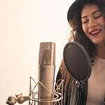 woman recording a song