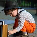 kid listening to radio