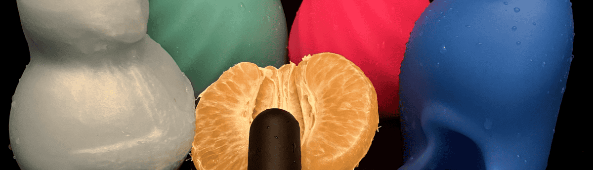 vibrador discreto encima de uma mexerica aberta