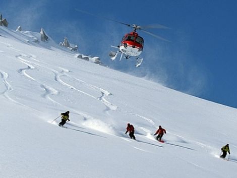 heliskiing-annapurna-mountain-range-snow-slopes-nepal-himalayas Adventurers Heliskiing Down Snow-Covered Slopes of Annapurna Mountain Range in Nepal Himalayas