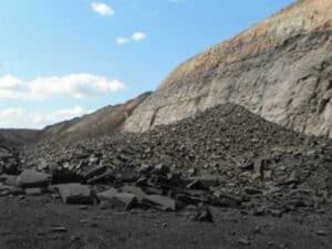 Final muckpile position against the highwall protecting the coal edge.