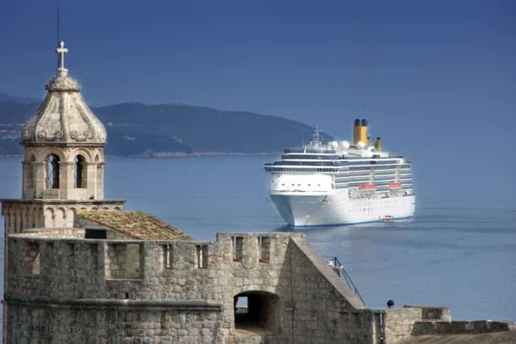 Cruise ship being visible from the walls of the old city, anchored near the Lokrum island