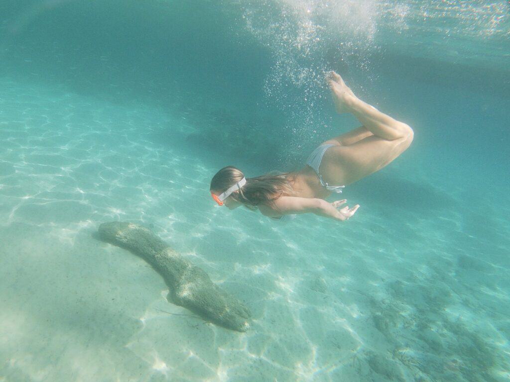 Girl Diving in Crystal Clear Adriatic SeaGirl diving on our private boat hire in Dubrovnik