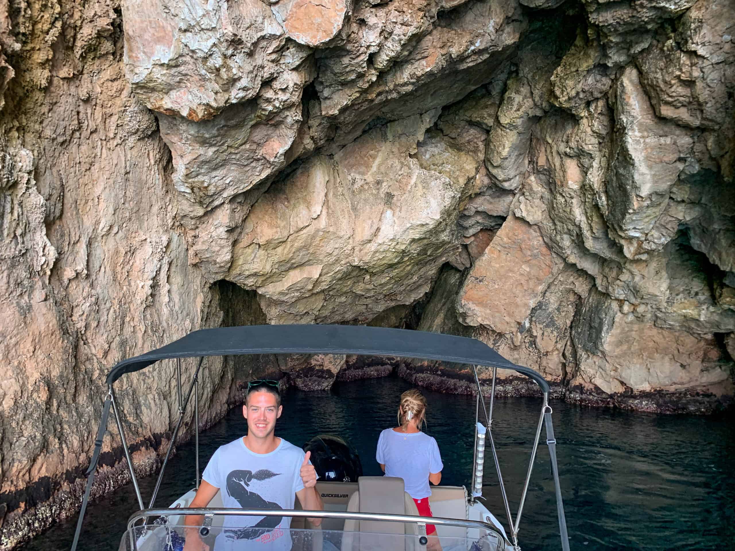Skipper, Guests, and Speedboat Inside Lopud Island's Cave: Adventurous Exploration"