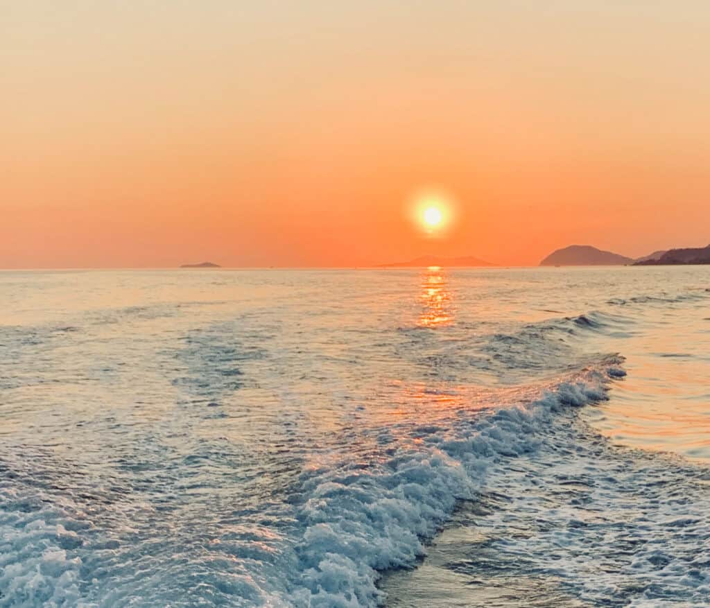 Sunset View of Lopud Island from Speedboat: Capturing Golden Hour Serenity