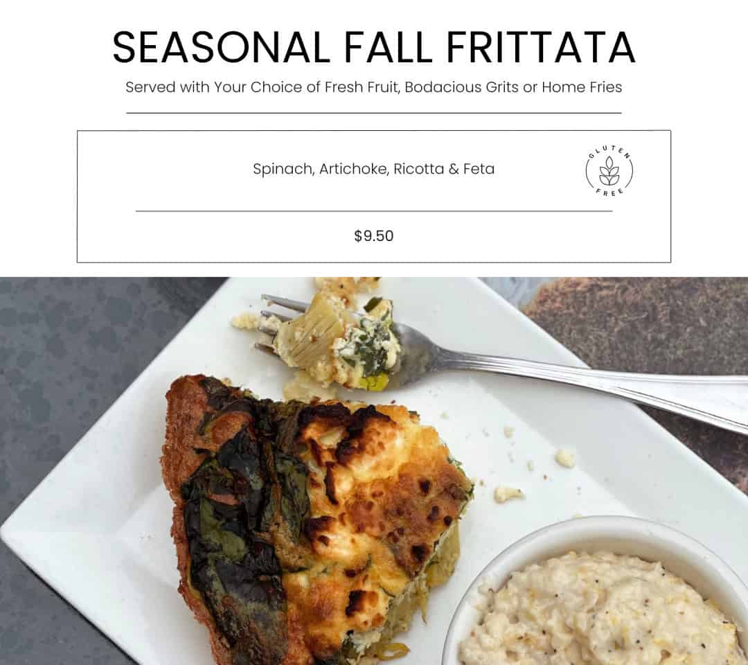 Bodacious Shops seasonal fall fritatta with spinach, artichoke, ricotta, and feta served with fresh fruit, Grits or home fries, featuring gluten-free options. Tasty, hearty breakfast or brunch dish.