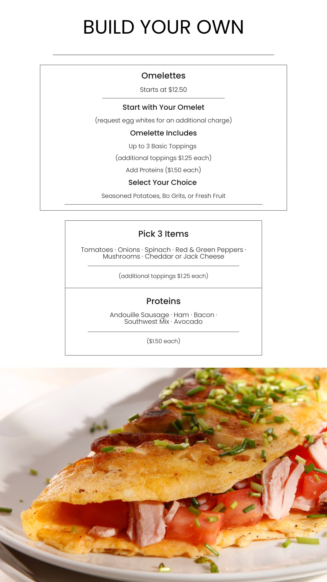 Delicious breakfast omelet with fresh ingredients, topped with chives, served on a white dish.