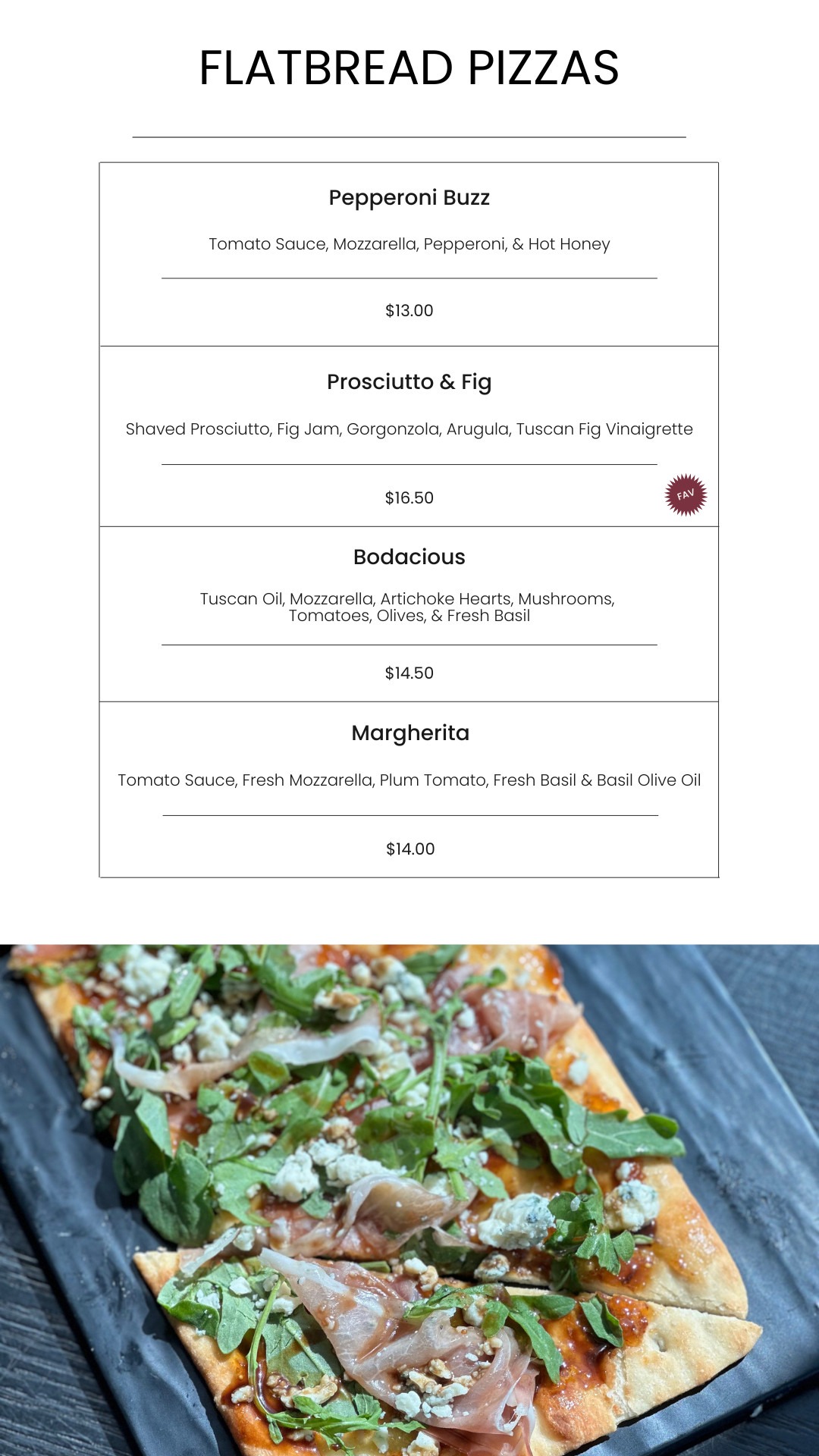 Hand-tossed flatbread pizza topped with arugula, prosciutto, feta, and fresh basil on a black serving plate. Perfect for gourmet pizza lovers seeking fresh ingredients and delicious flavors.