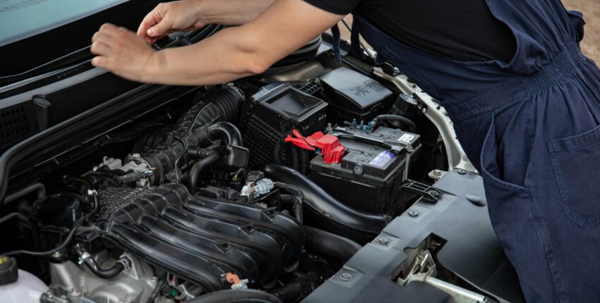 Engine maintenance check during vehicle service at Boise Muffler Auto Repair.