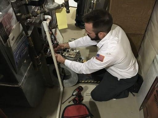 Bonfe Tech working on a furnace
