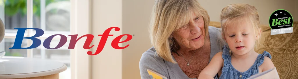 An older woman reads a book titled "Forever Furnace" with a young girl indoors. The word “Bonfe” and a 2023 Best Reader’s Choice silver winner badge are visible.