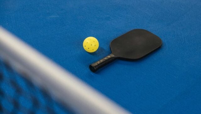 Beginner Pickleball class at BOV with players practicing on the court.