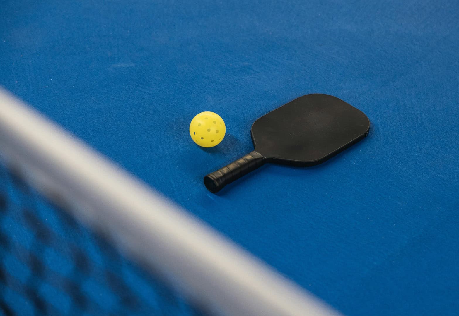 Beginner Pickleball class at BOV with players practicing on the court.