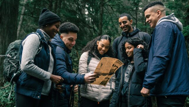 4 Fun Ways to Keep Your Family Fit 1 Family staying active together outdoors with creative fitness activities like hiking and obstacle courses.