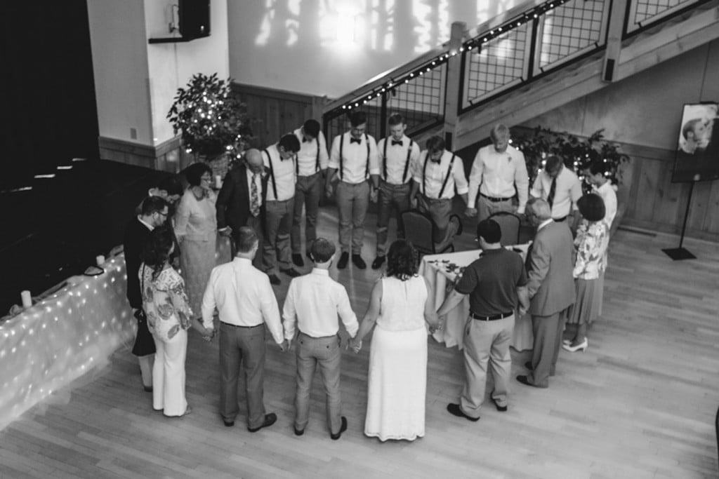 A black and white photo capturing a wedding ceremony in Silverthorne, CO.