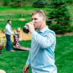 Courtney and James enjoying a drink in their love-filled backyard.
