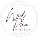 A circular badge with the text “Featured in Wed Plan Madison Magazine” in a mix of handwritten and uppercase fonts on a white background.