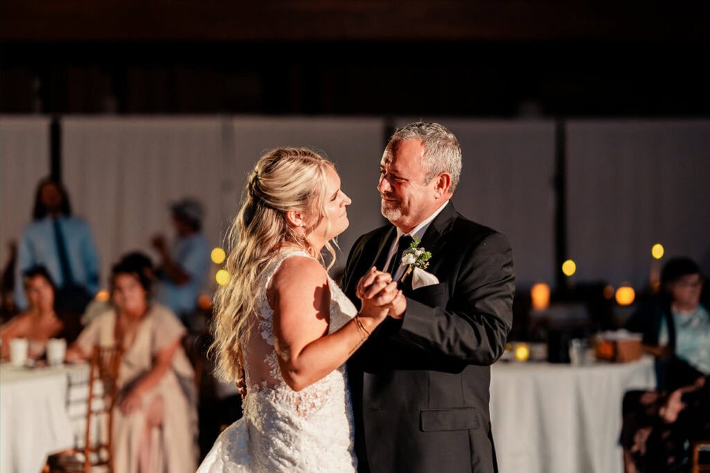 father-daughter-first-dance-wedding-reception-west-salem-wi.jpg Bride and groom sharing a dance at their wedding reception during Sunny May Magic at Maple Grove Events.
