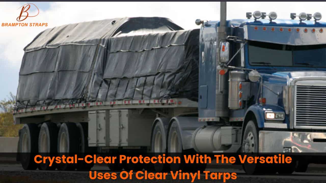 A large flatbed truck covered with a black clear vinyl tarp, transporting cargo securely, showcasing Brampton Straps' durable and versatile tarpaulin products.