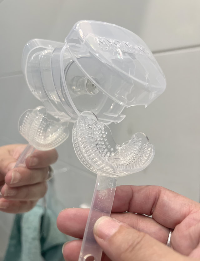 Clear orthodontic mouthguard for teeth protection and sports safety.