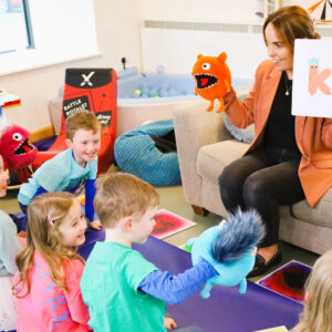 Engaging therapy session demonstrating MyoTape for children with sensitive skin.