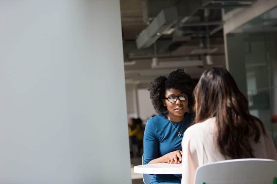A picture of a woman interviewing another woman at a job interview.