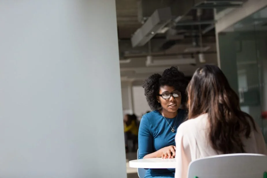 A picture of a woman interviewing another woman at a job interview.