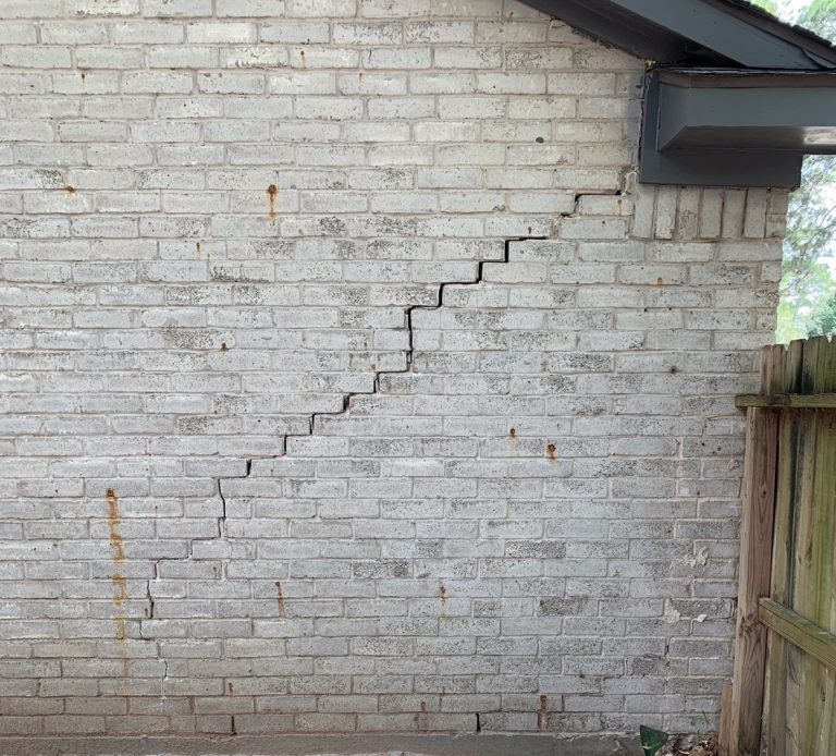 Cracked Brick Wall Exterior