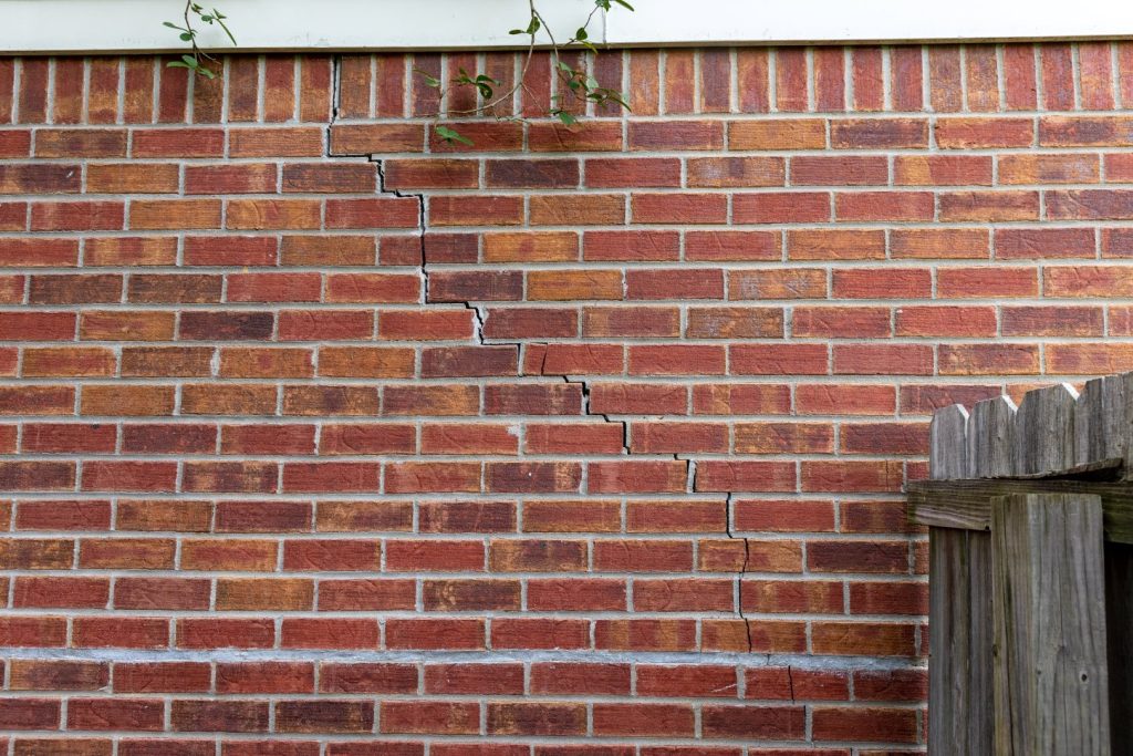 Cracked Brick and Mortar on Home