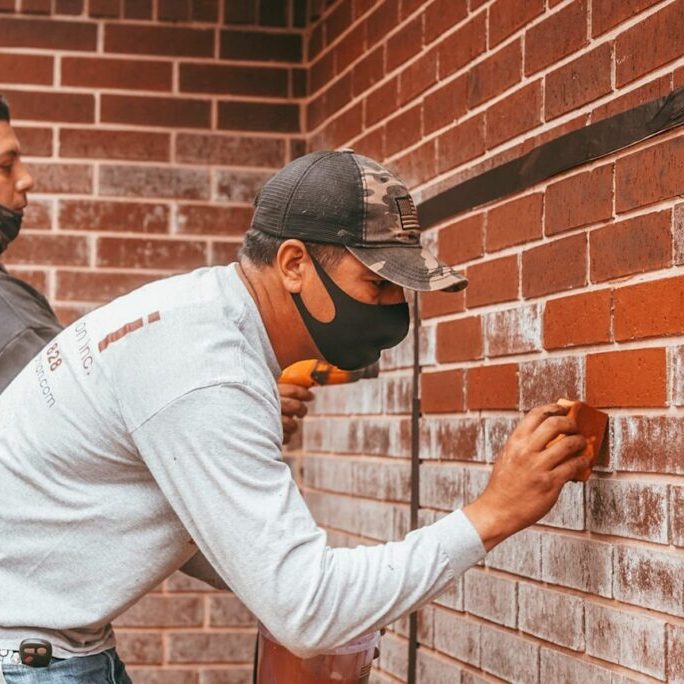 Brick Restoration Mason Crew Working brick restoration mason crew working