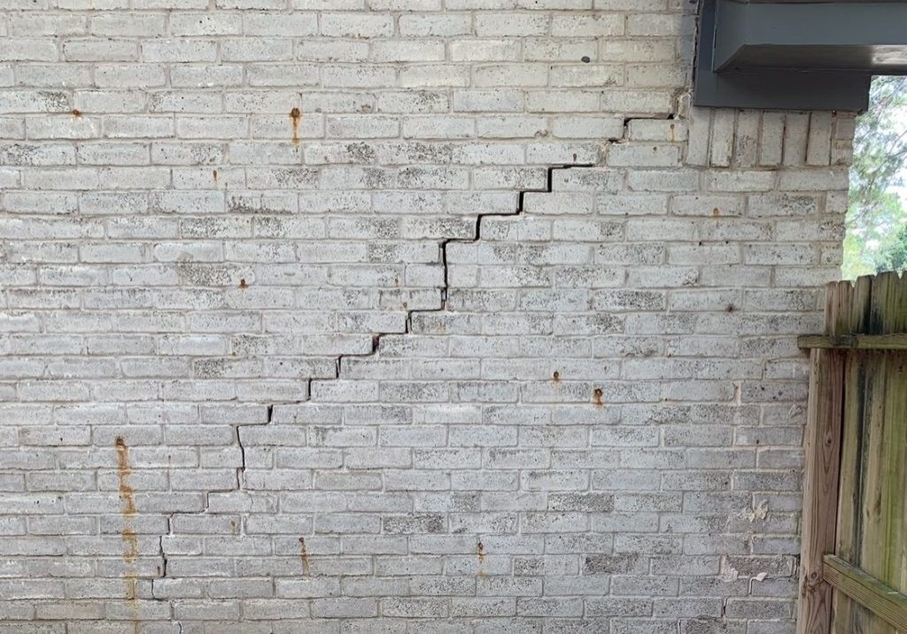 Cracked Brick Wall Exterior