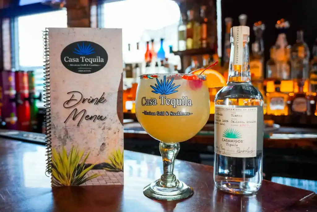 Refreshing tequila cocktail with a bottle at Casa Tequila Mexican Grill & Cantina.