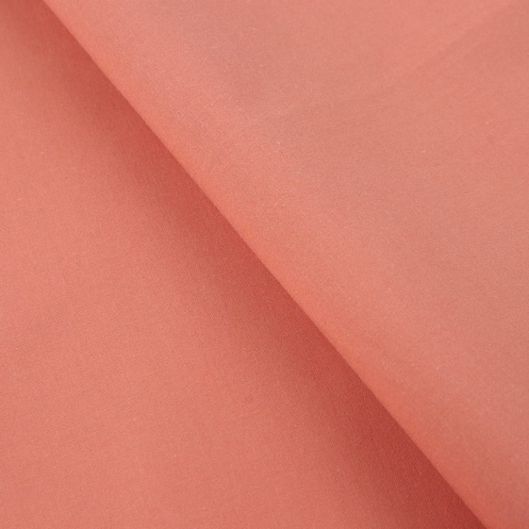 Peach colour poplin fabric