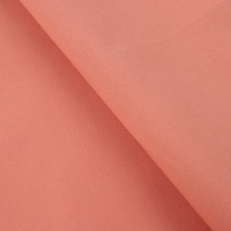 Peach colour poplin fabric