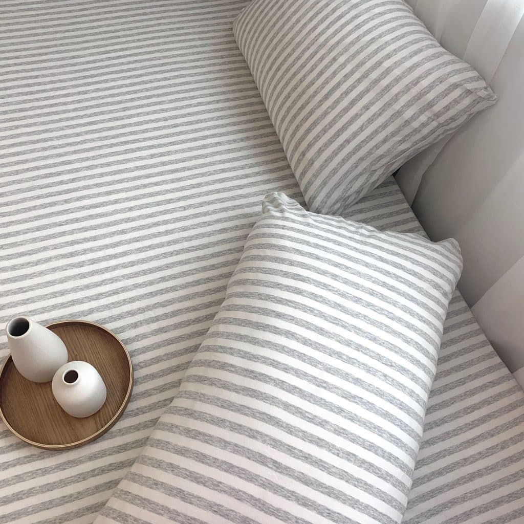 Grey & white jersey fabric used for bedsheet and pillows