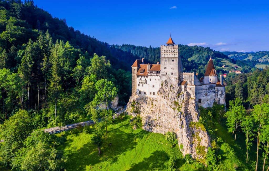 Bran Castle near Brasov surrounded by forest and hills