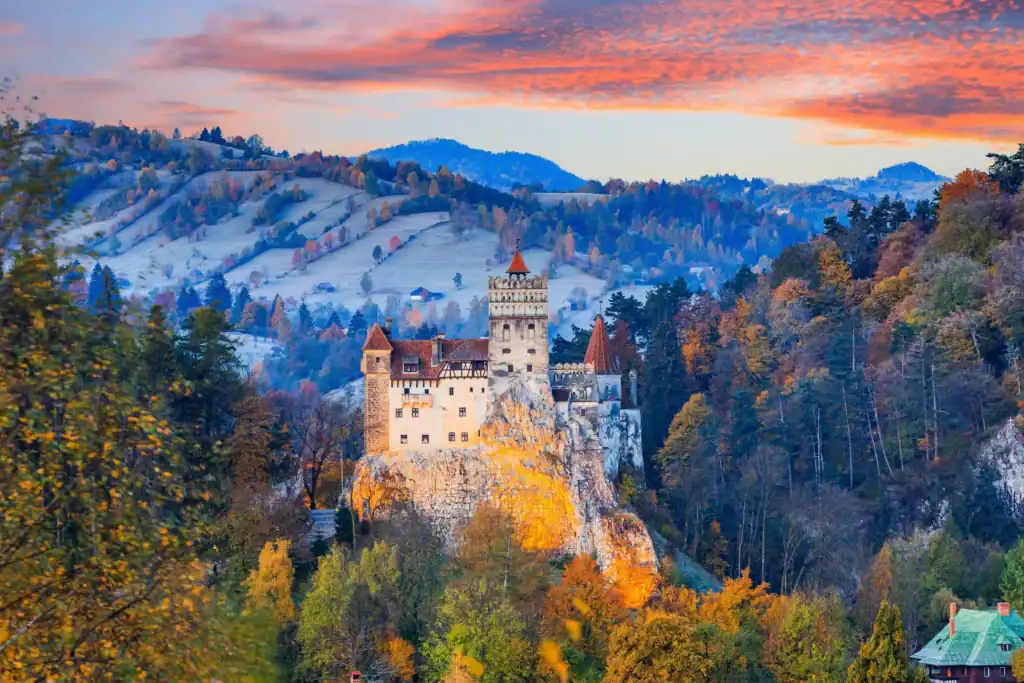 Castle in the Carpathian Mountains during autumn, Romania, part of private Brașov tour from Buchares.
