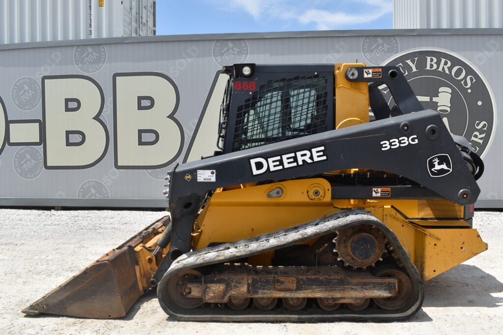 John Deere 333G compact track loader at heavy equipment auction.