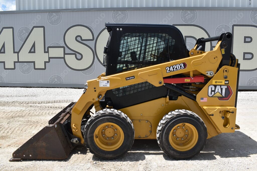 Caterpillar 242D3 compact loader at heavy equipment auction.
