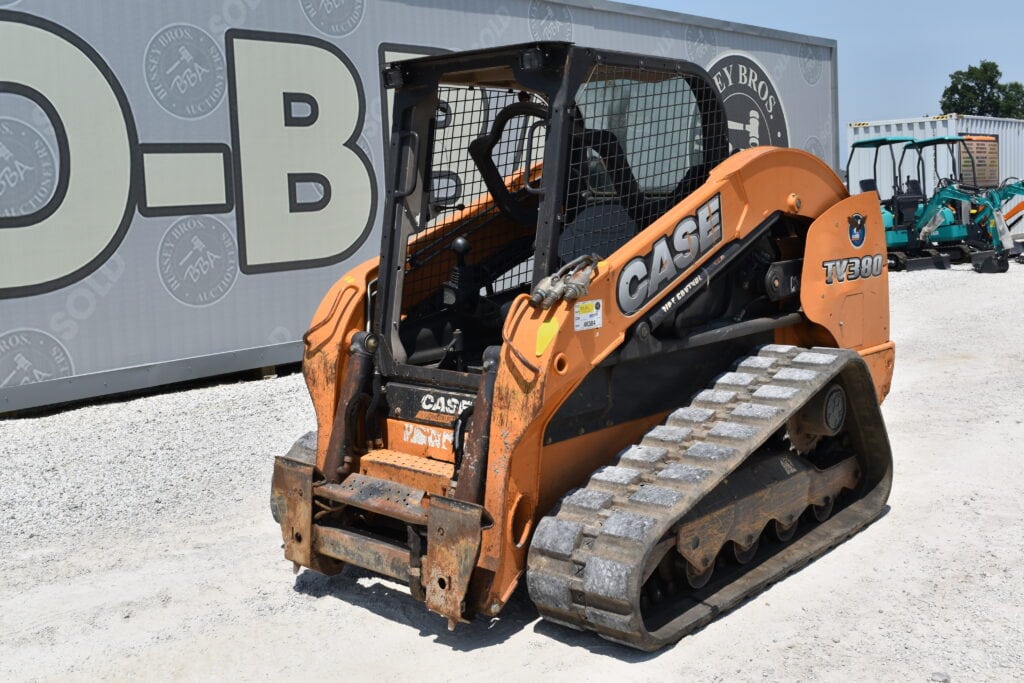 Orange Case TV380 compact track loader at heavy equipment auction.