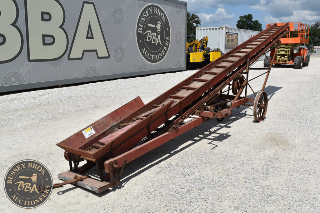 Rusty conveyor belt for heavy equipment auction at Bussey Bros.