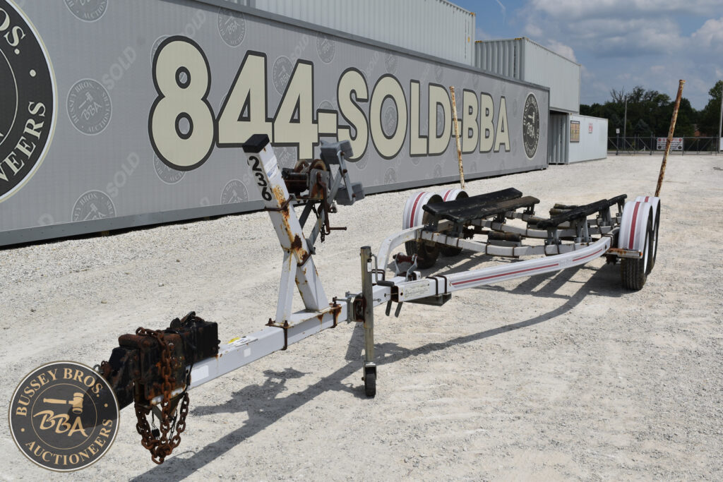 Auction trailer for heavy equipment at Bussey Bros Auctioneers.