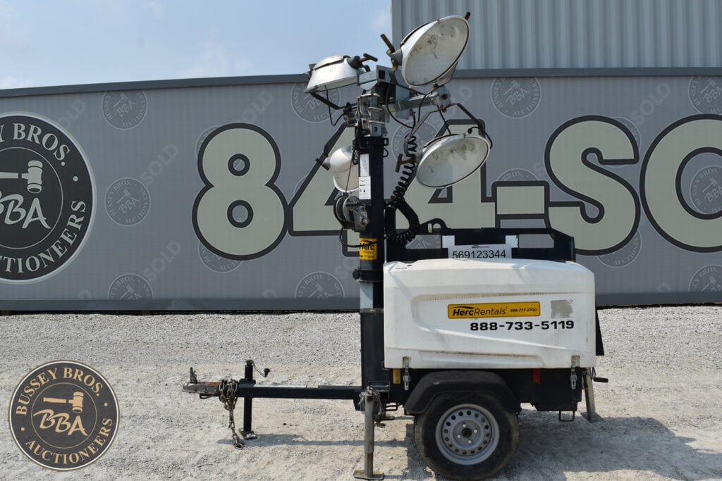 Portable lighting tower with multiple floodlights at Bussey Bros Auction.